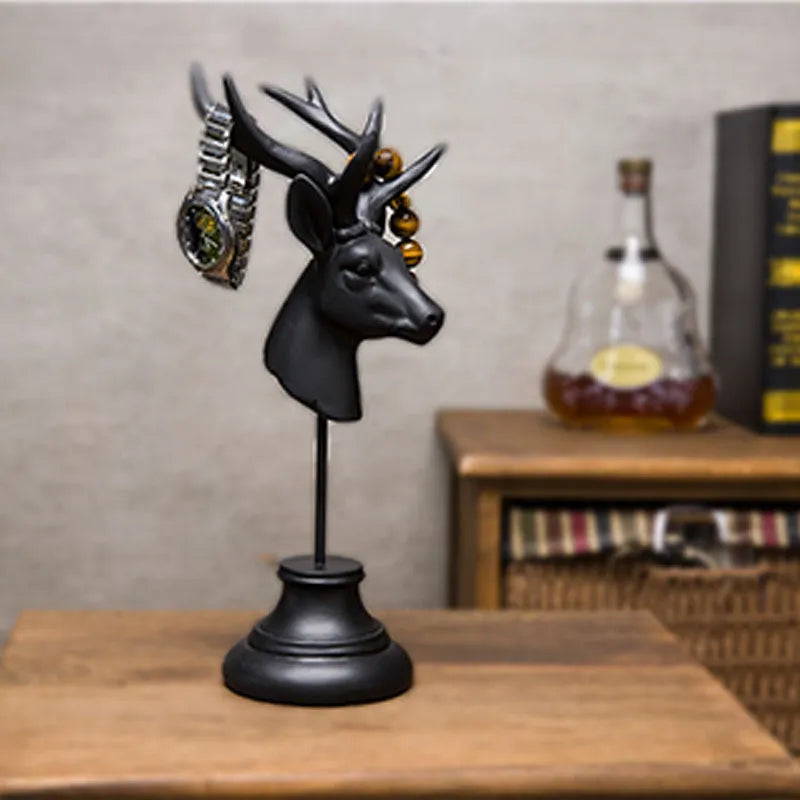 Solid natural resin animal decoration centrepiece in black, white, or wood colour, dimensions 13 by 15 by 32 centimetres.