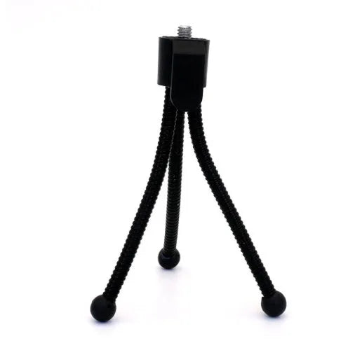 Small black iron frame mini tripod with ball head, shown extended next to a smartphone for scale.