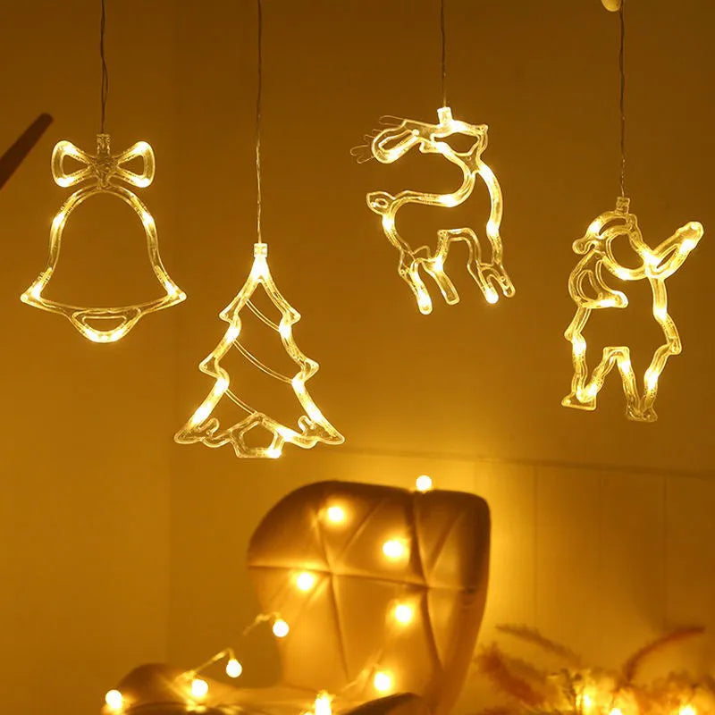 Christmas LED decorative light with suction cup showing Santa Claus, elk and snowman designs on window