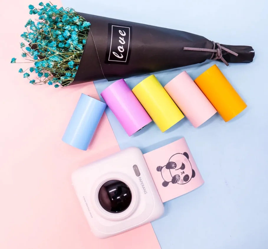PerPage mini thermal printer paper rolls in regular, sticker, and label types with blue, pink, white, violet, and yellow options