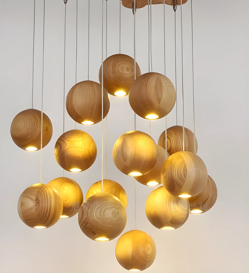 Nordic style wooden ball chandelier with solid wood construction hanging from a ceiling on an adjustable cord.