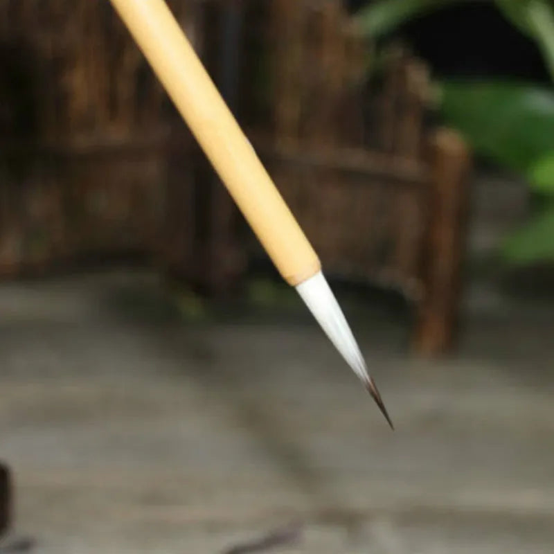 Four gold-body writing brushes with mixed-hair heads in pine branch colour set