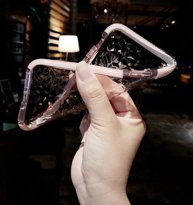 Striped TPU back case for iPhone in pink, white, and black edge colour options.