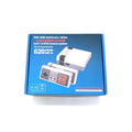 Compact black 8-bit NES retro game console with two red controllers on a stand.