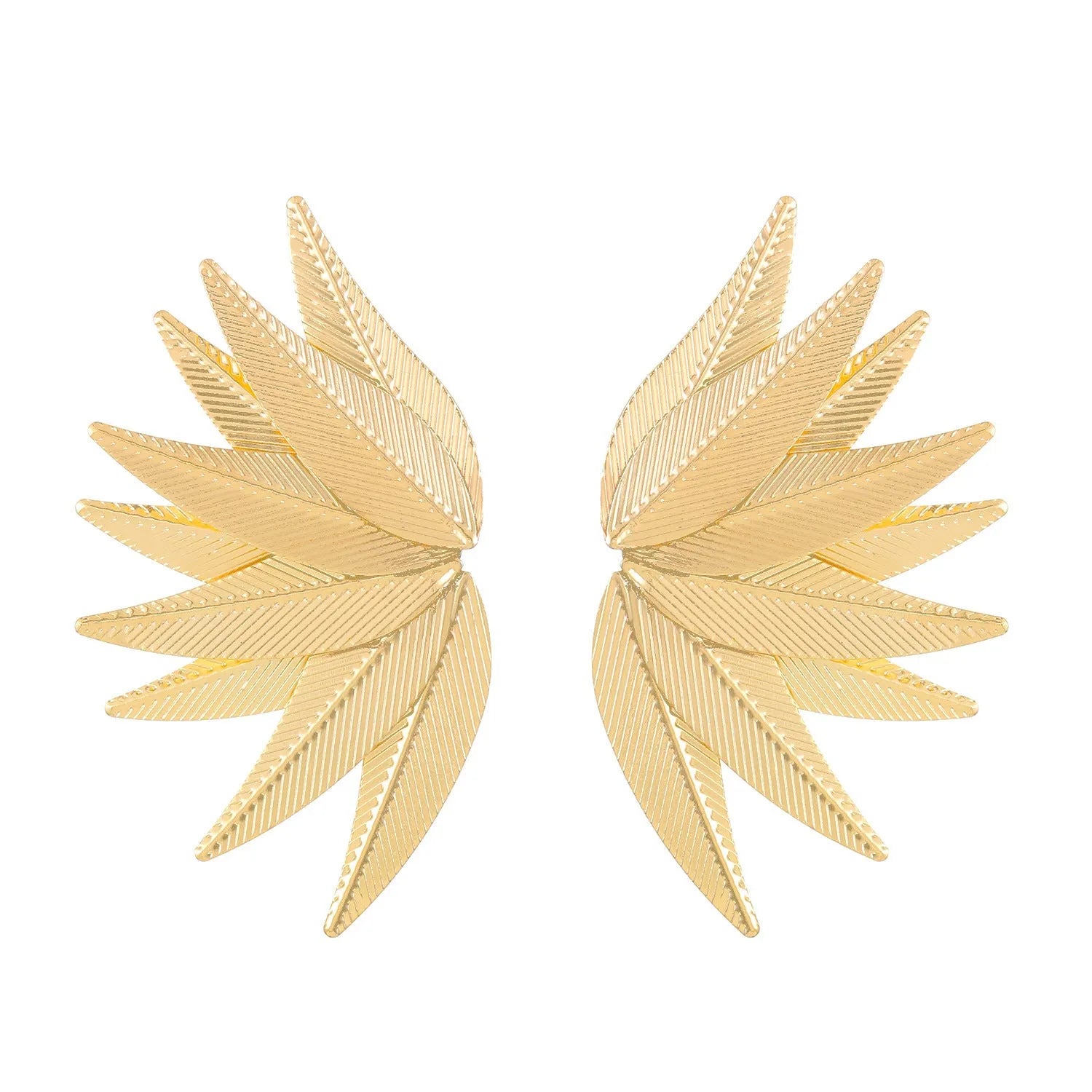 Gold and white alloy leaf-shaped patch earrings on a plain background