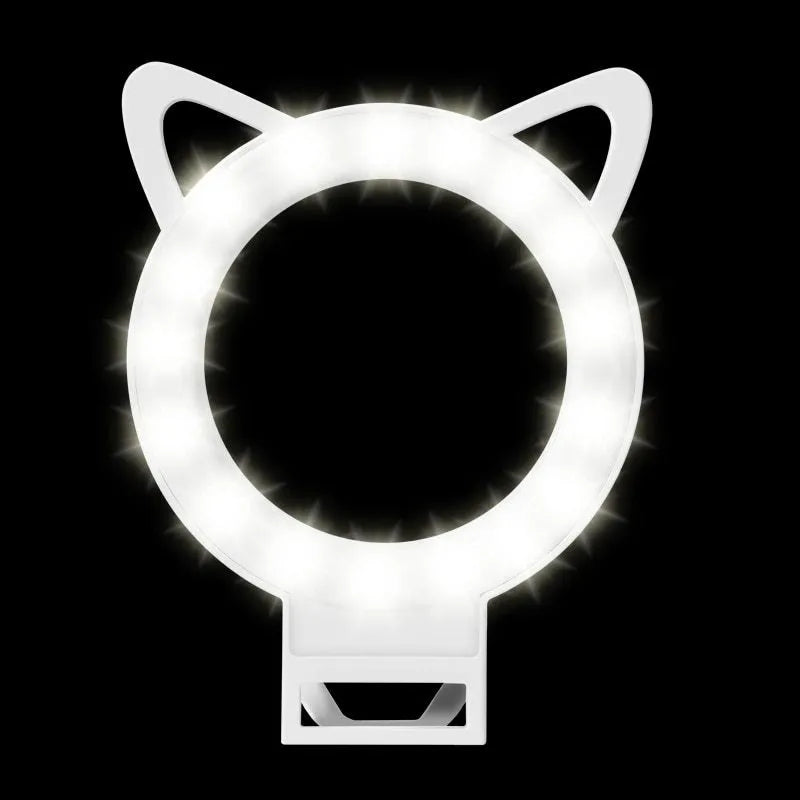LED selfie ring light clipped to a phone, USB powered, available in white pink blue black ABS