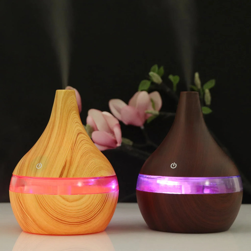 USB mini air purifier humidifier with wood grain finish in columnar shape for small rooms.