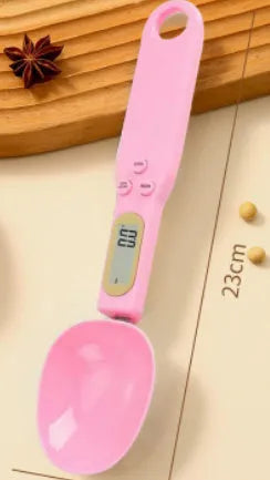 White digital kitchen spoon scale with LCD display showing weight measurement