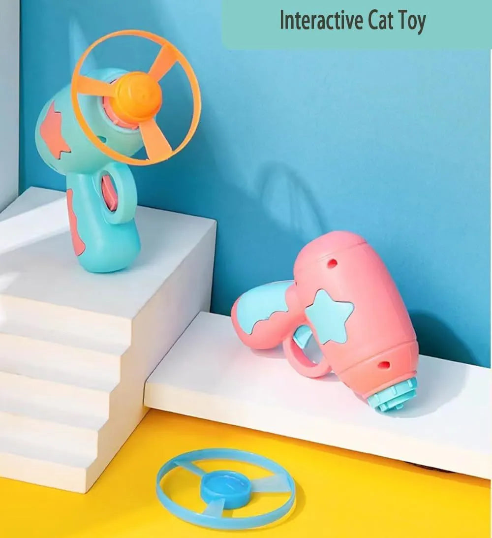 Blue plastic cat toy gun with spinning frisbee launcher for indoor play