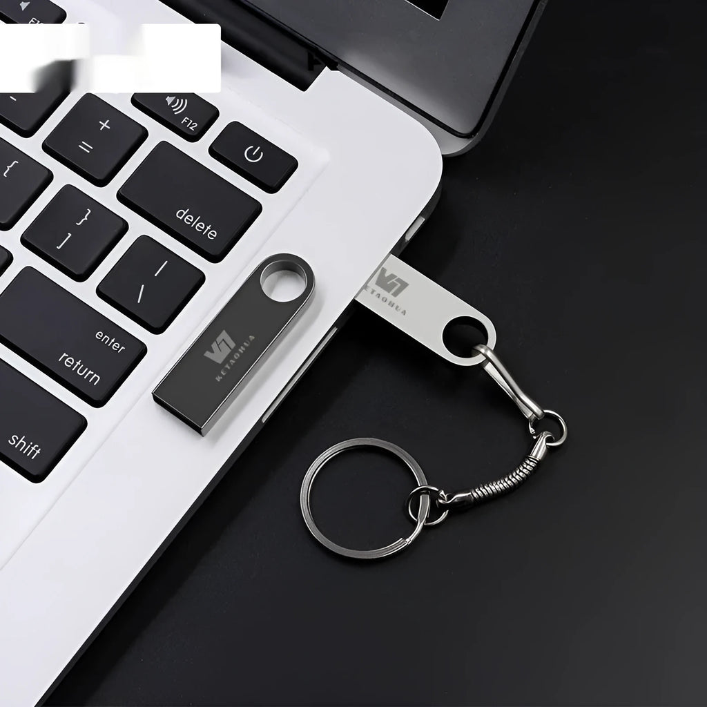 Metal car-shaped USB flash drive in silver colour showing compact dimensions