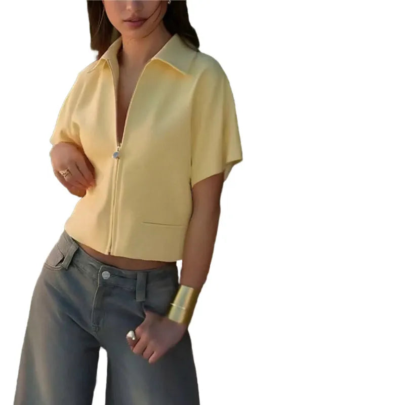 Man wearing a loose-fit yellow short-sleeve casual polyester shirt.
