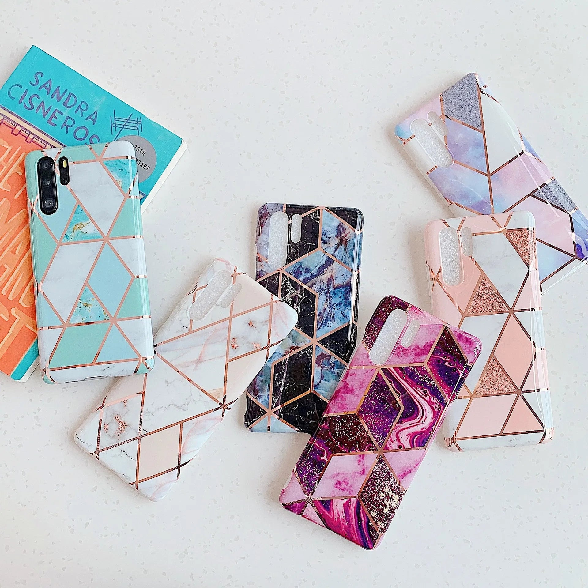 Electroplated marble design phone case for Huawei and Samsung smartphones in various colours.