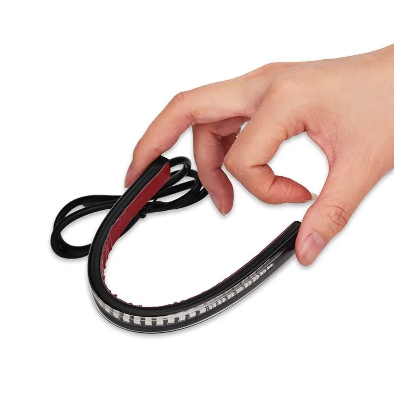 Universal flexible 48 SMD LED motorcycle tail stop light strip with brake and turn signal lights on black rubber