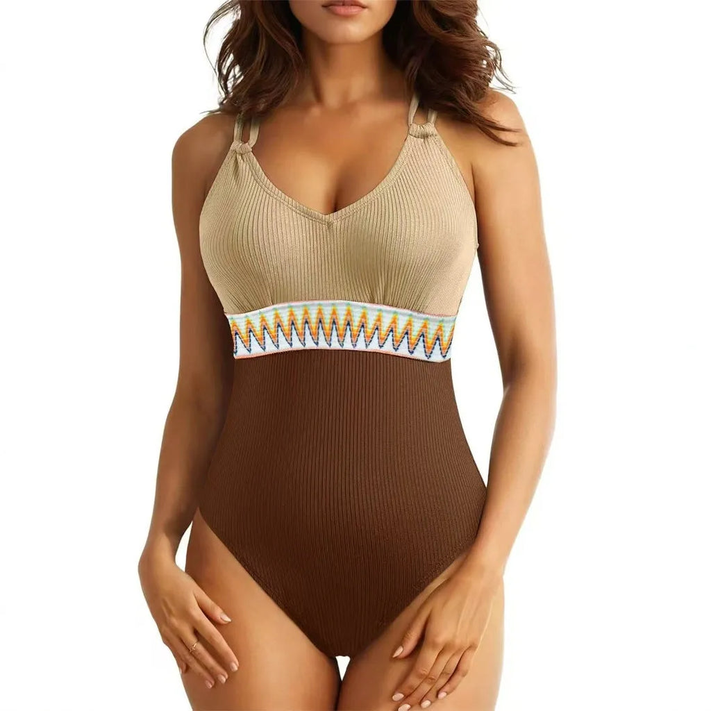 Women's one-piece solid colour rib fabric swimsuit with panel stitching in blue on model