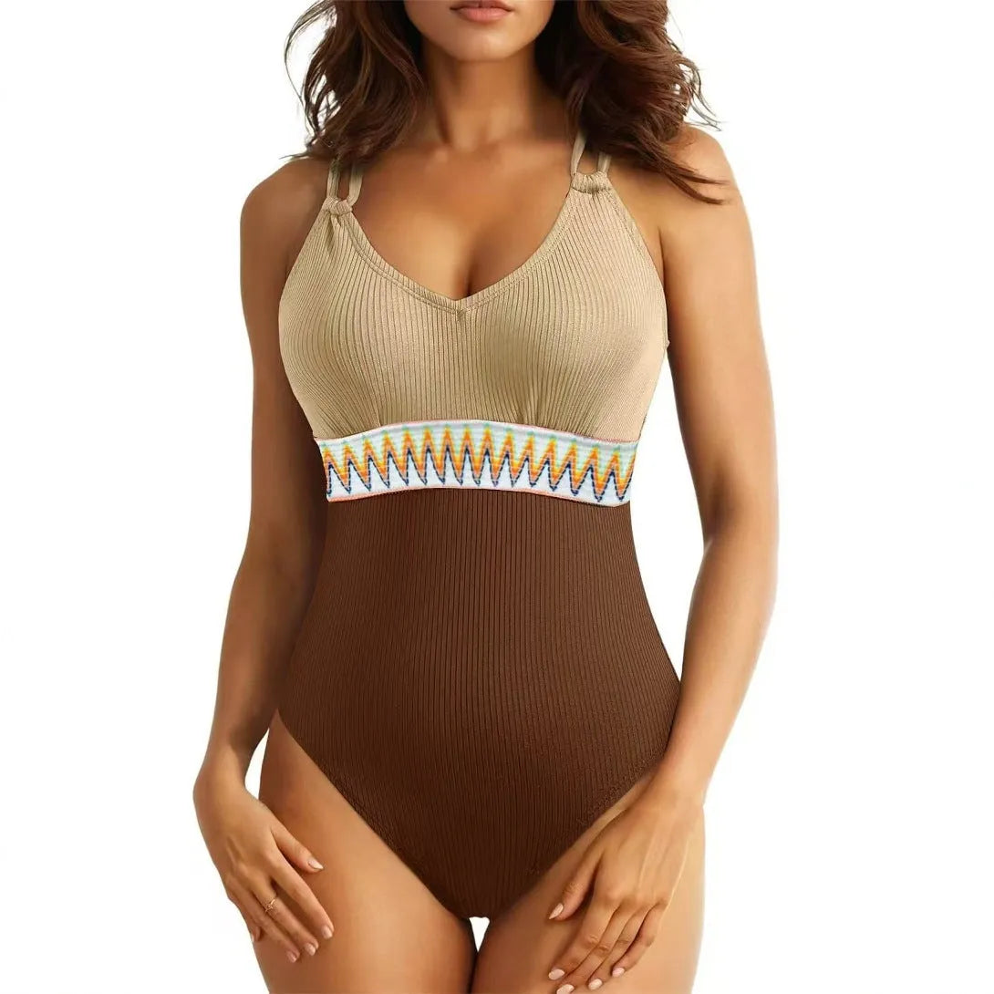 Women's one-piece solid colour rib fabric swimsuit with panel stitching in blue on model