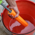 Orange EVA foam water blaster with pump action cannon mechanism and foam grip handle