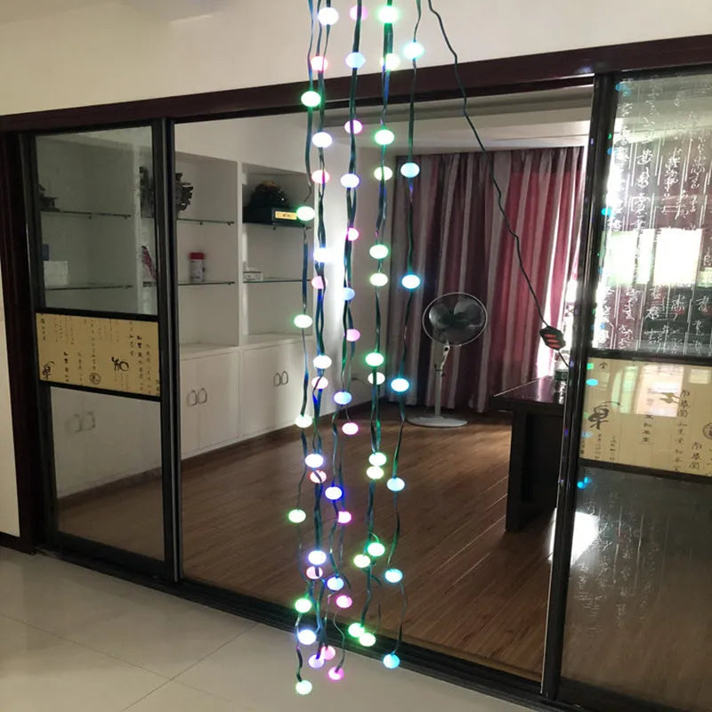 1.8 metre long Christmas tree light string with 64 colour-changing LED lights and a control button.