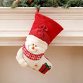 Large red and white knitted Christmas stocking with Santa Claus design for fireplace mantel decoration