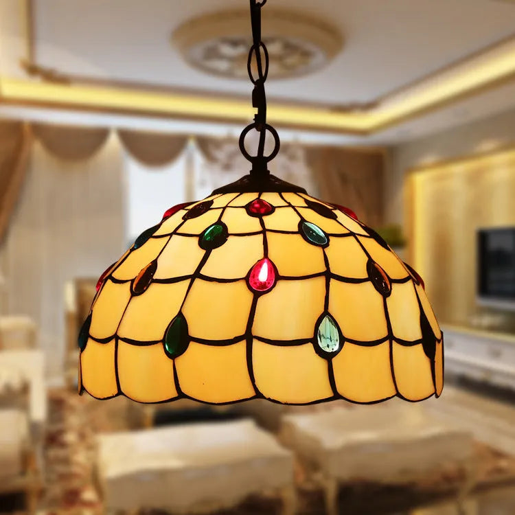 European baroque style chandelier with abstract shape and coloured glaze finish, shown as a hanging ornament.