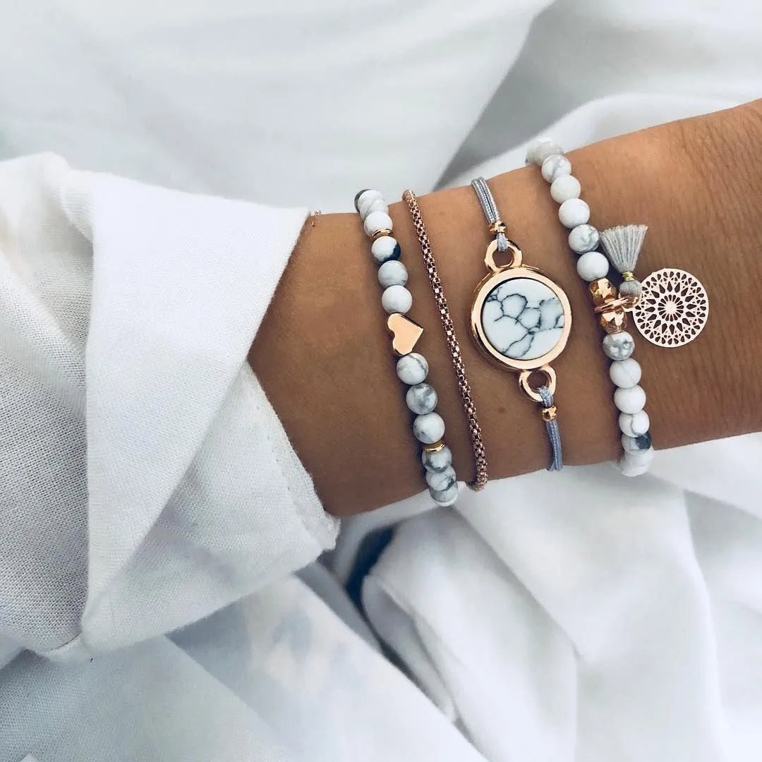 Love Map bracelet set in alloy with electroplated finish, shown in five styles and a variety of colours
