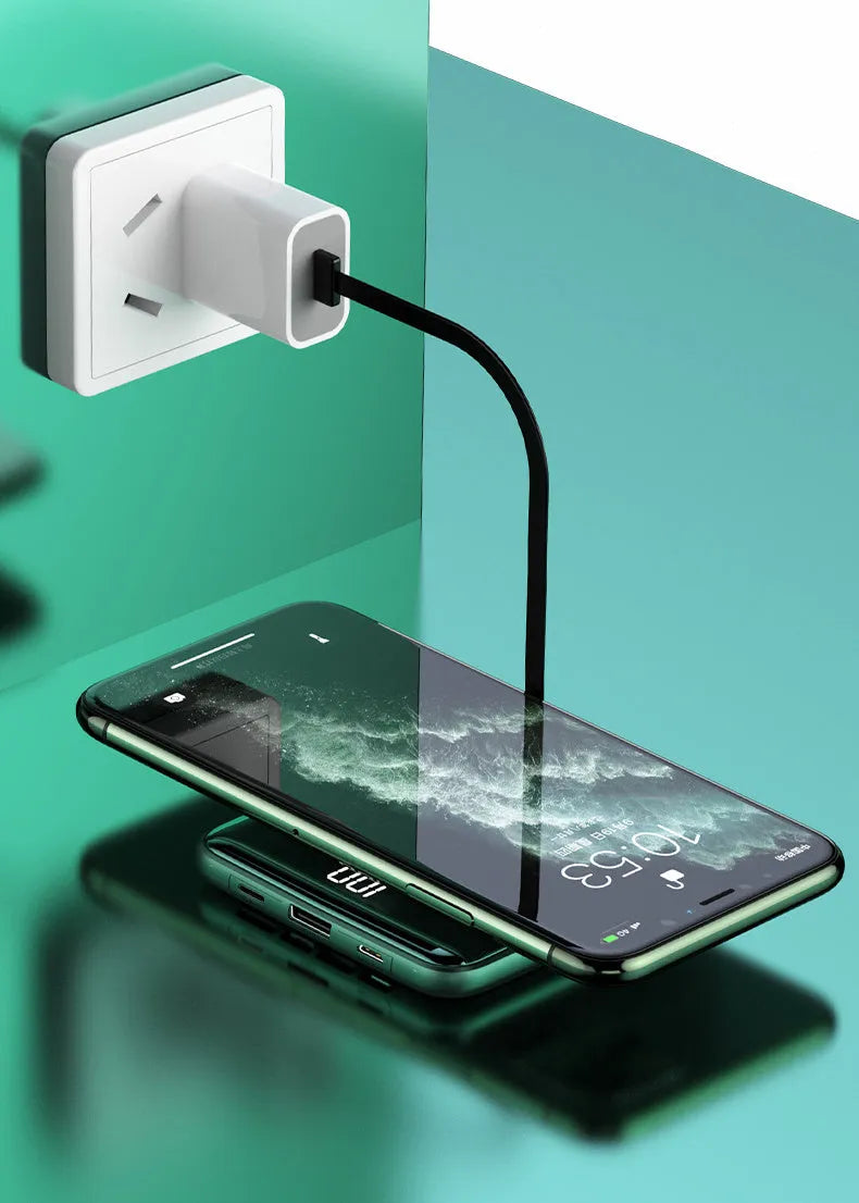 Black 20000mAh fast charging power bank with LCD display showing battery percentage.