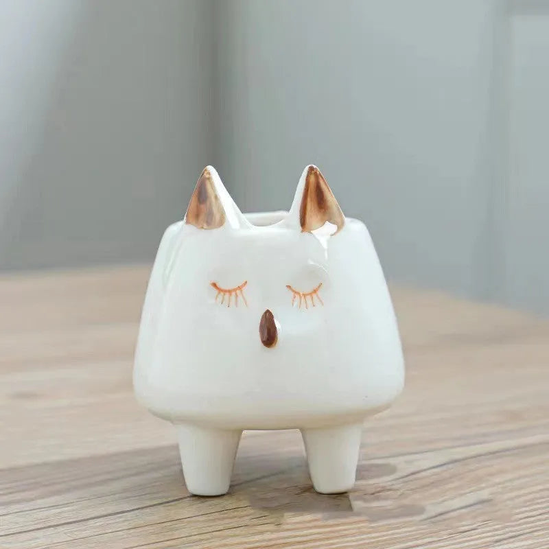 Ceramic succulent flowerpot with hand-painted cartoon animal design in pastel colours