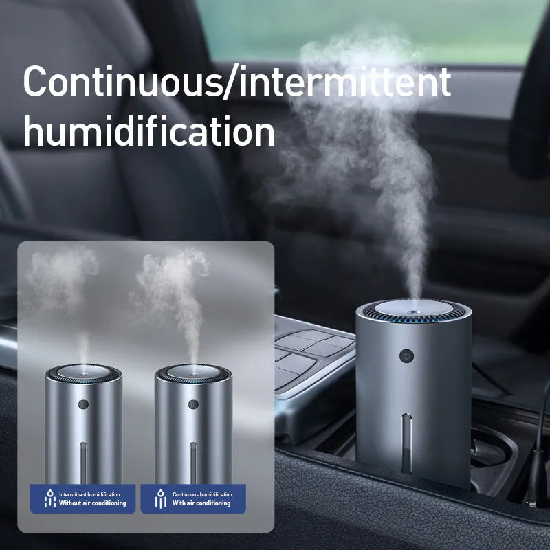 Black aluminium alloy car humidifier and air purifier with USB cable, shown in a vehicle cup holder.