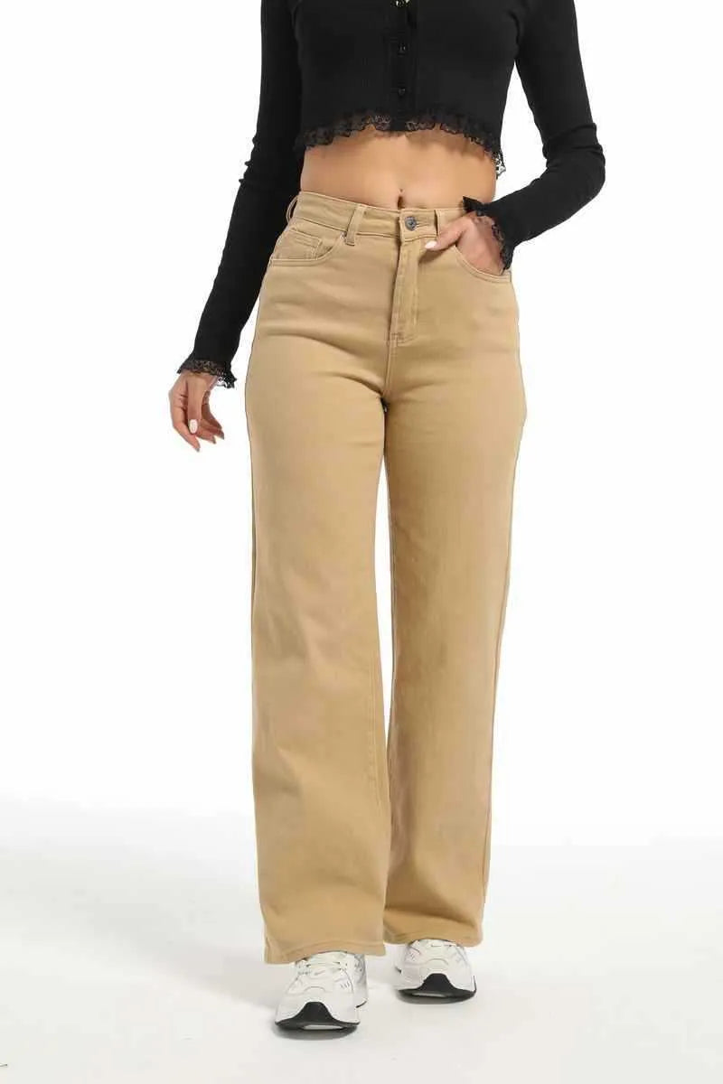 Women's apricot straight-leg wide trousers with a high waist on a hanger.
