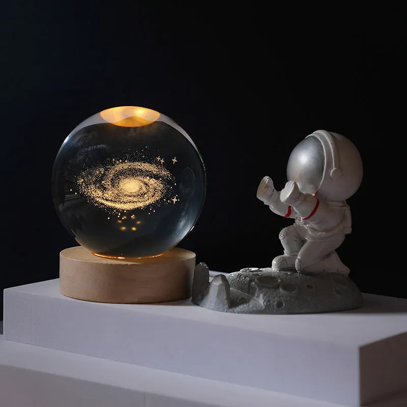 Luminous crystal ball night light with USB plug-in, 6cm or 8cm ball, wooden base and astronaut push option.