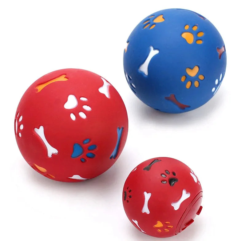 Pet puzzle ball for dogs with skeleton and footprint patterns, blue or red, 7.5cm and 11cm sizes