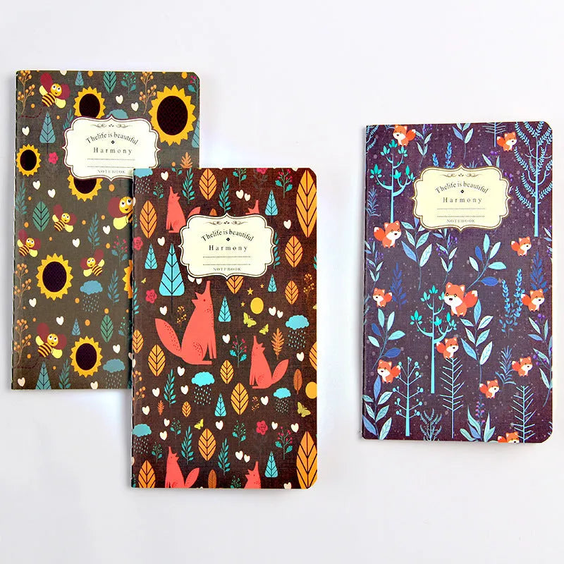 A5 kraft paper notebook with hand-stitched binding and a leather tassel, showing natural cover colour.