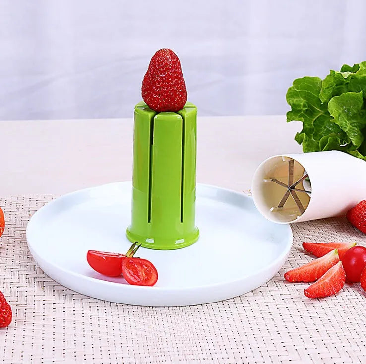 White kitchen vegetable and fruit slicer with six stainless steel blades.