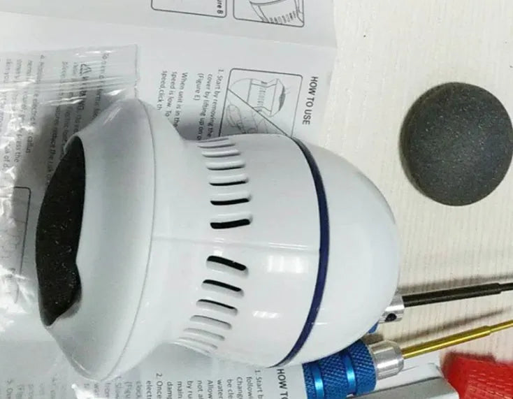 Beige electric foot file grinder with vacuum system and USB charging cable