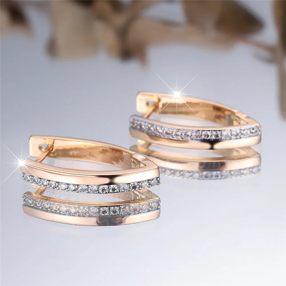 Women's V-shaped geometric ear clips in champagne gold white diamond finish