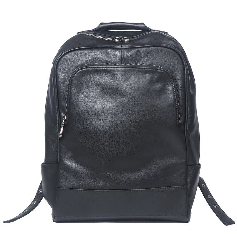 Men's black first layer cowhide leather travel backpack with multiple zipper pockets and top handles, 30cm by 42cm.