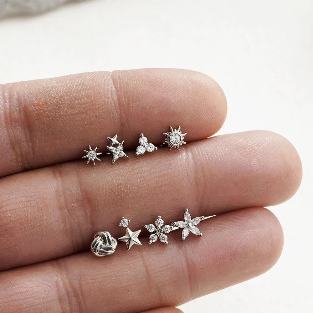 Titanium steel mini ear bone stud with electroplated gold finish and zircon crystal accent in geometric shape