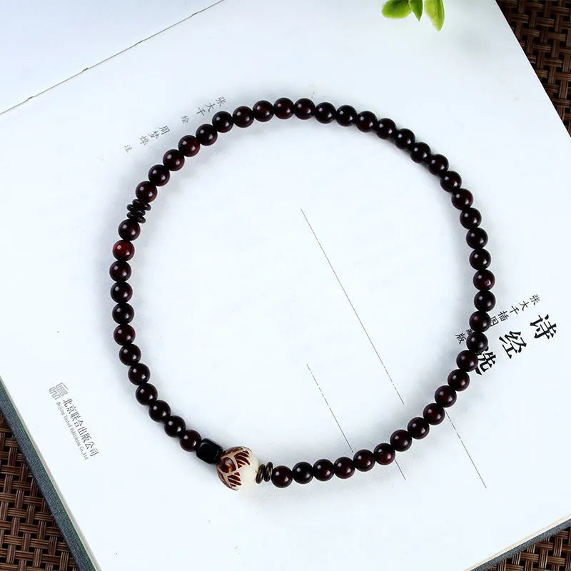 Natural rosewood double-ring bracelet with floral design and knitted construction