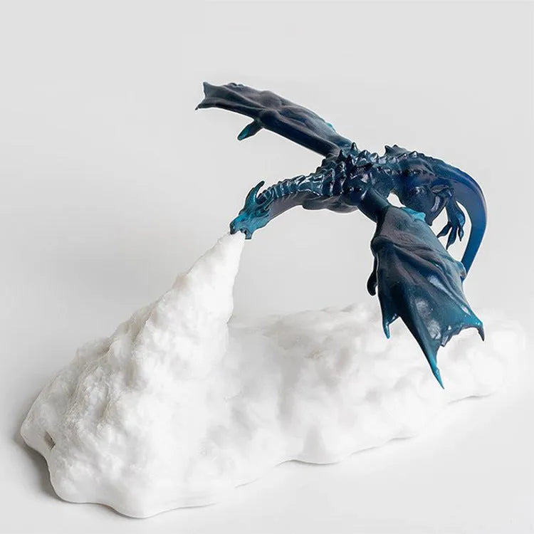 3D printed red dragon night light glowing on a bedside table