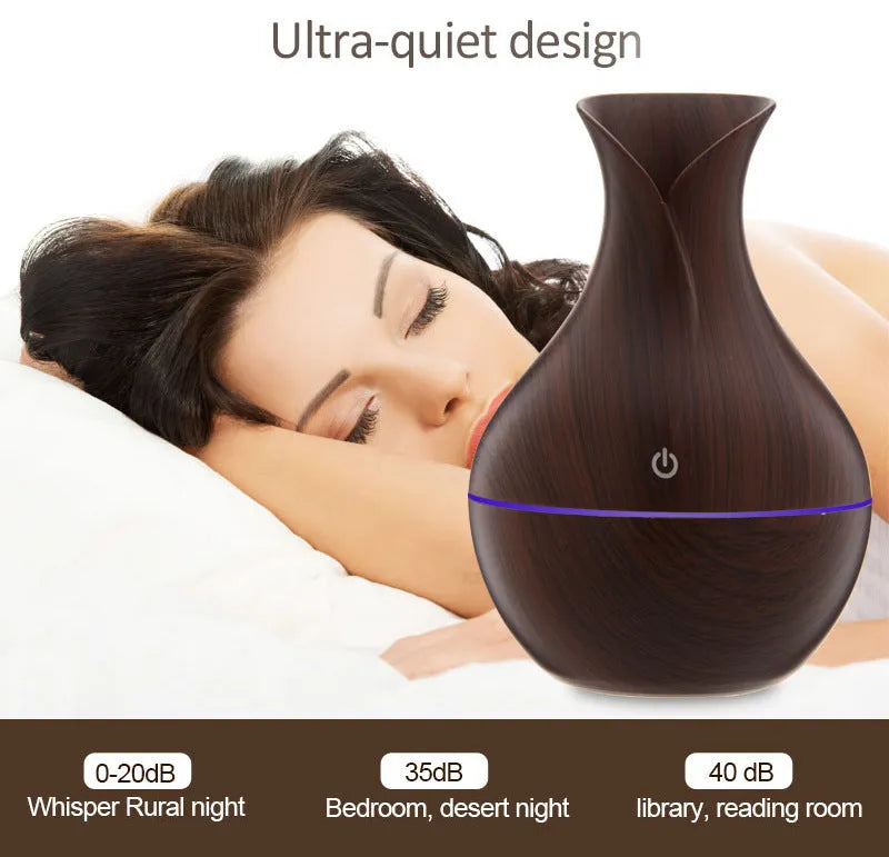 Small vase humidifier with 130ml water tank in Crackle Mahogany finish, USB powered, on a wooden desk