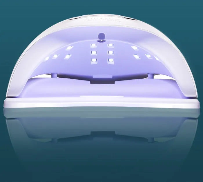 White 120W UV LED gel nail polish dryer lamp with timer display and multiple light settings.