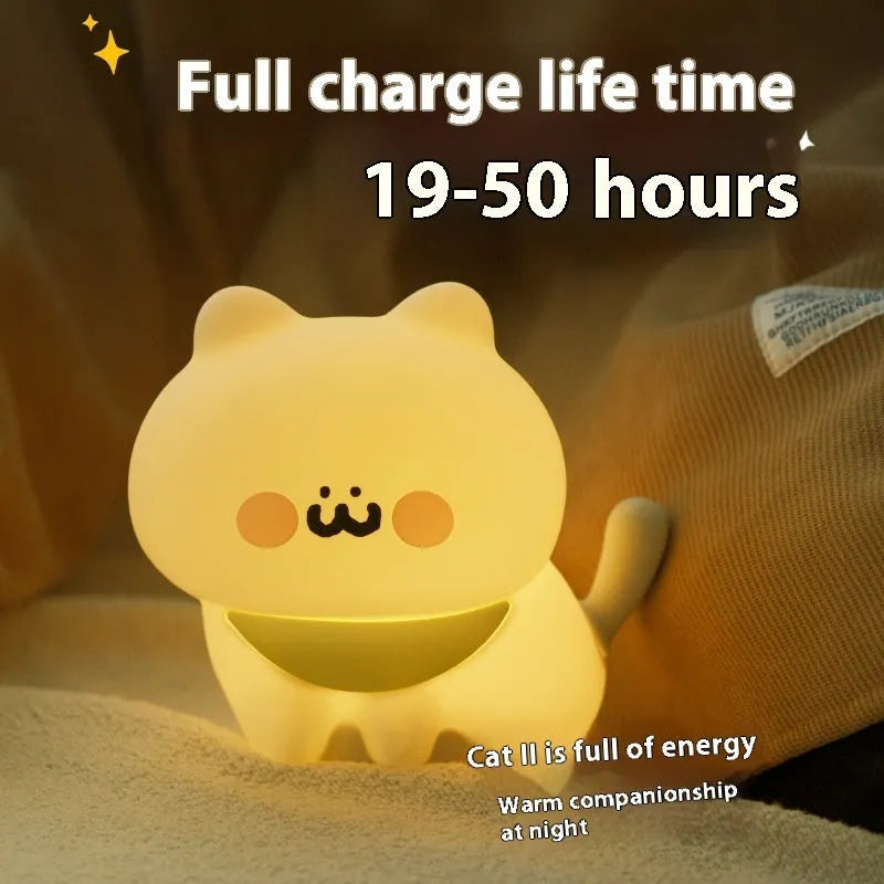 Cartoon silicone happy kitten night light with yellow light and built-in battery for bedside use