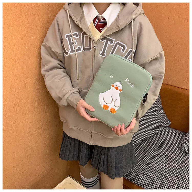 Blue cotton tablet case with duck embroidery, zipper closure, and 11inch to 15to16inch size options
