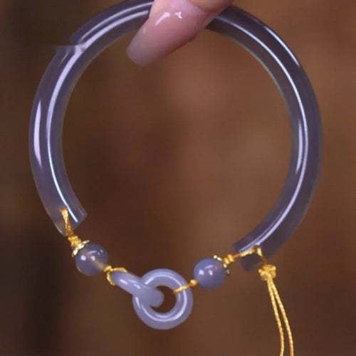 Smoke purple agate half bracelet with ring buckle closure on grey background
