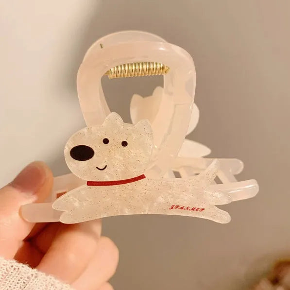 Cartoon puppy design hair barrettes in beige and brown colours with grip mechanism