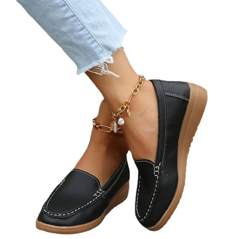 Women's flat slip-on shoes in PU leather, shown in multiple colours with a round toe and rubber sole.