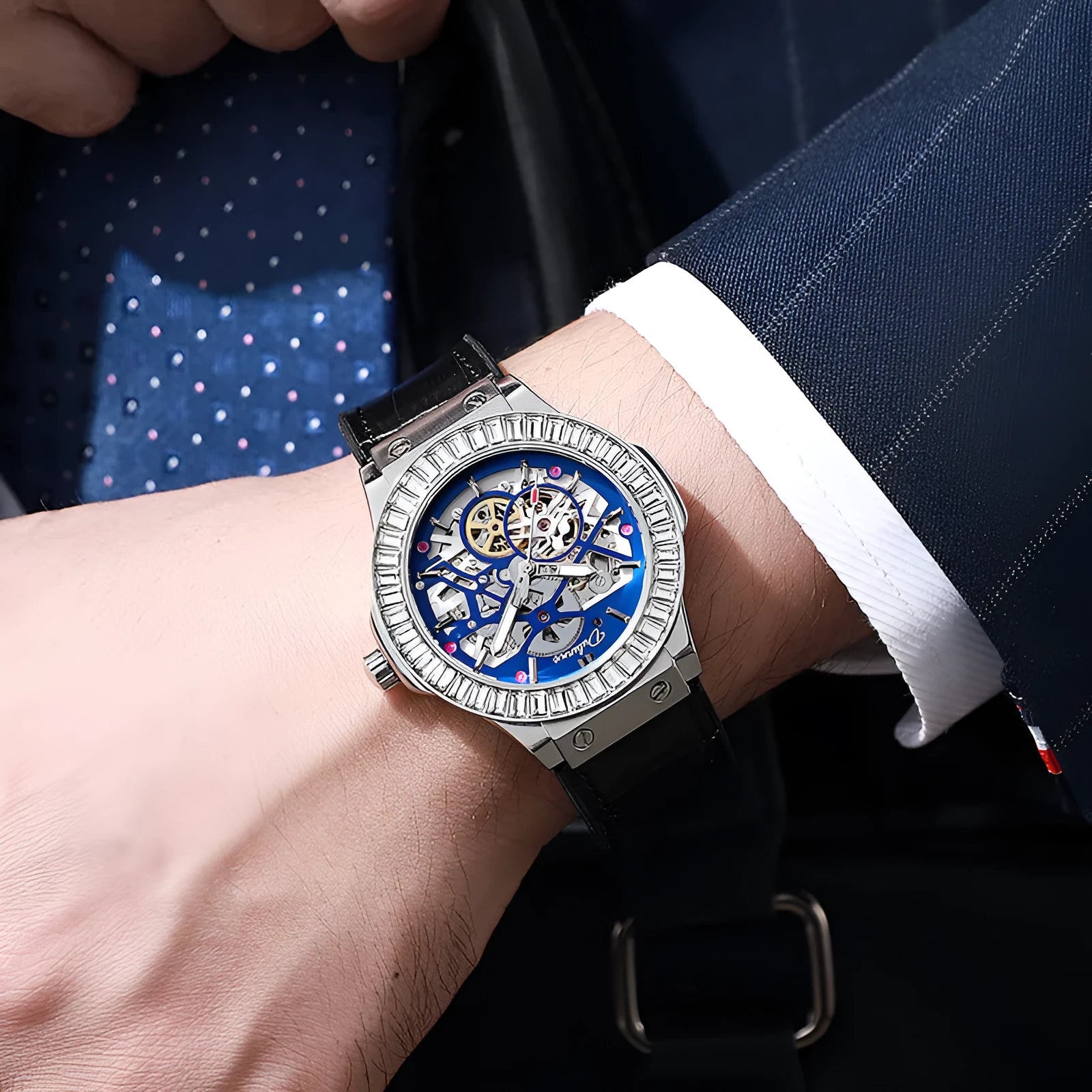 Men's automatic mechanical skeleton watch with diamond studs on a white dial.
