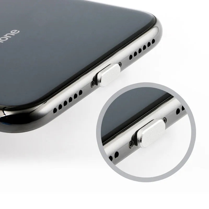 Aluminium alloy iPhone charging port dust plug in various colours on a white background.