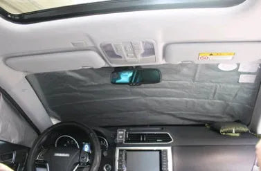 Magnetic car windshield cover with 6 magnets, black and silver, 210x125cm on a car windshield for snow protection