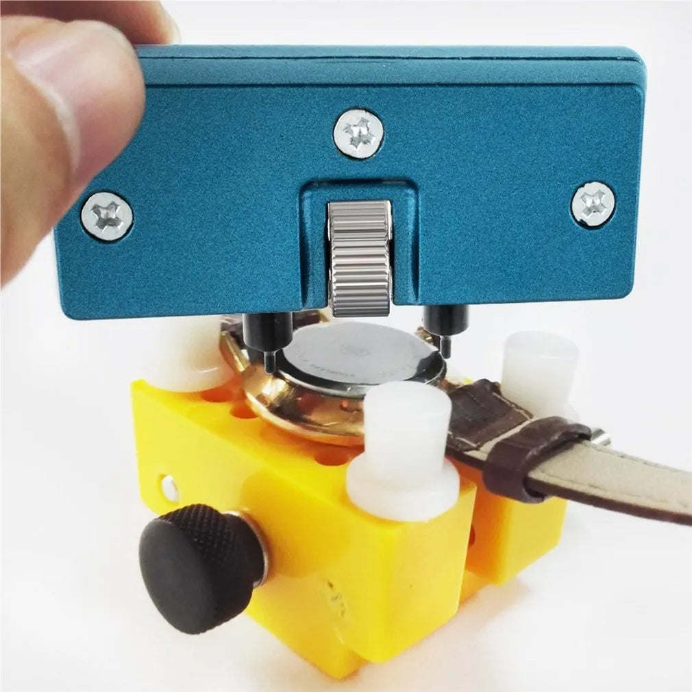 Yellow plastic watch case opener tool and fixing base with four pillars for DIY repair.