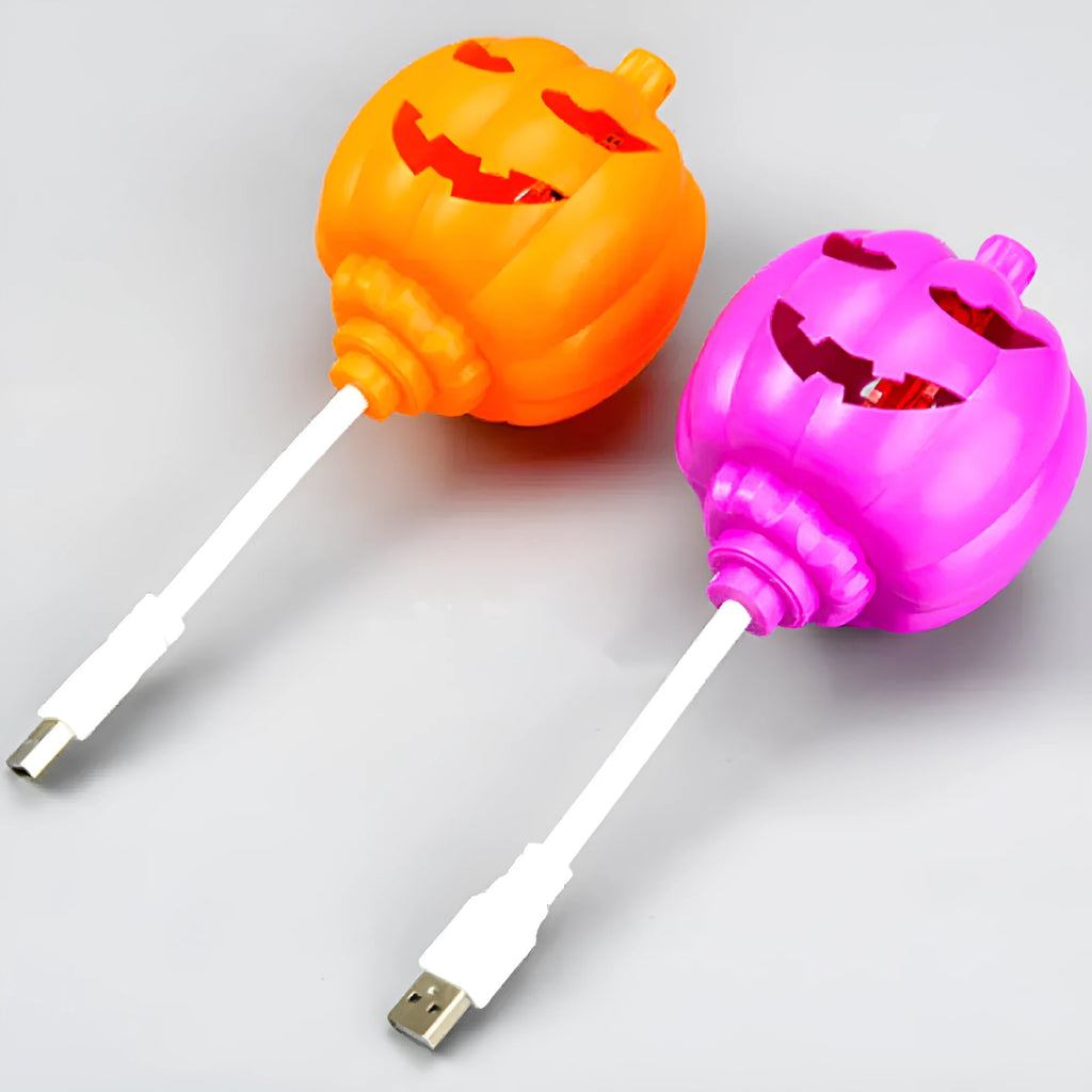 USB rechargeable plastic pumpkin lamp with purple or yellow LED lighting measuring 8.3cm diameter